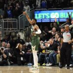 Milwaukee Bucks guard Malik Beasley (5) reacts after scoring a basket during the third quarter against the Indiana Pacers during game five of the first round for the 2024 NBA playoffs at Fiserv Forum.