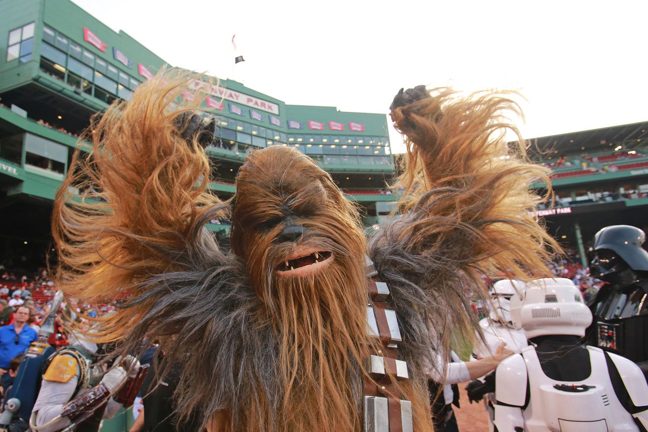 (05/04/2015 Boston, MA) May the 4th Be with You... Chewbacca, a character from Star Wars movies, was on hand to throw out the ceremonial first pitch at Fenway Park on Monday, May 4, 2015. Staff Photo by Matt West