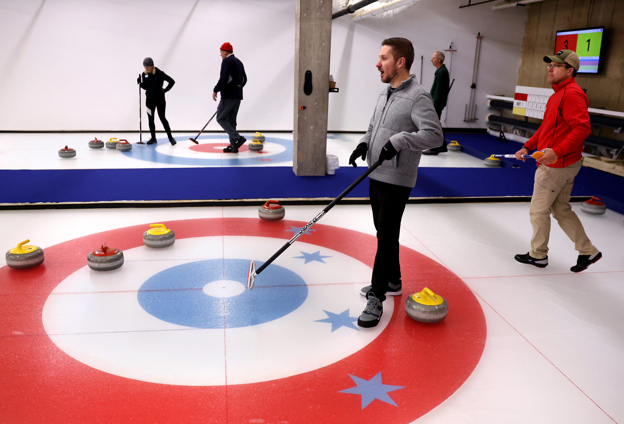 Dan Wiechec, left, and Scott Gerstenkorn, right, look on while...