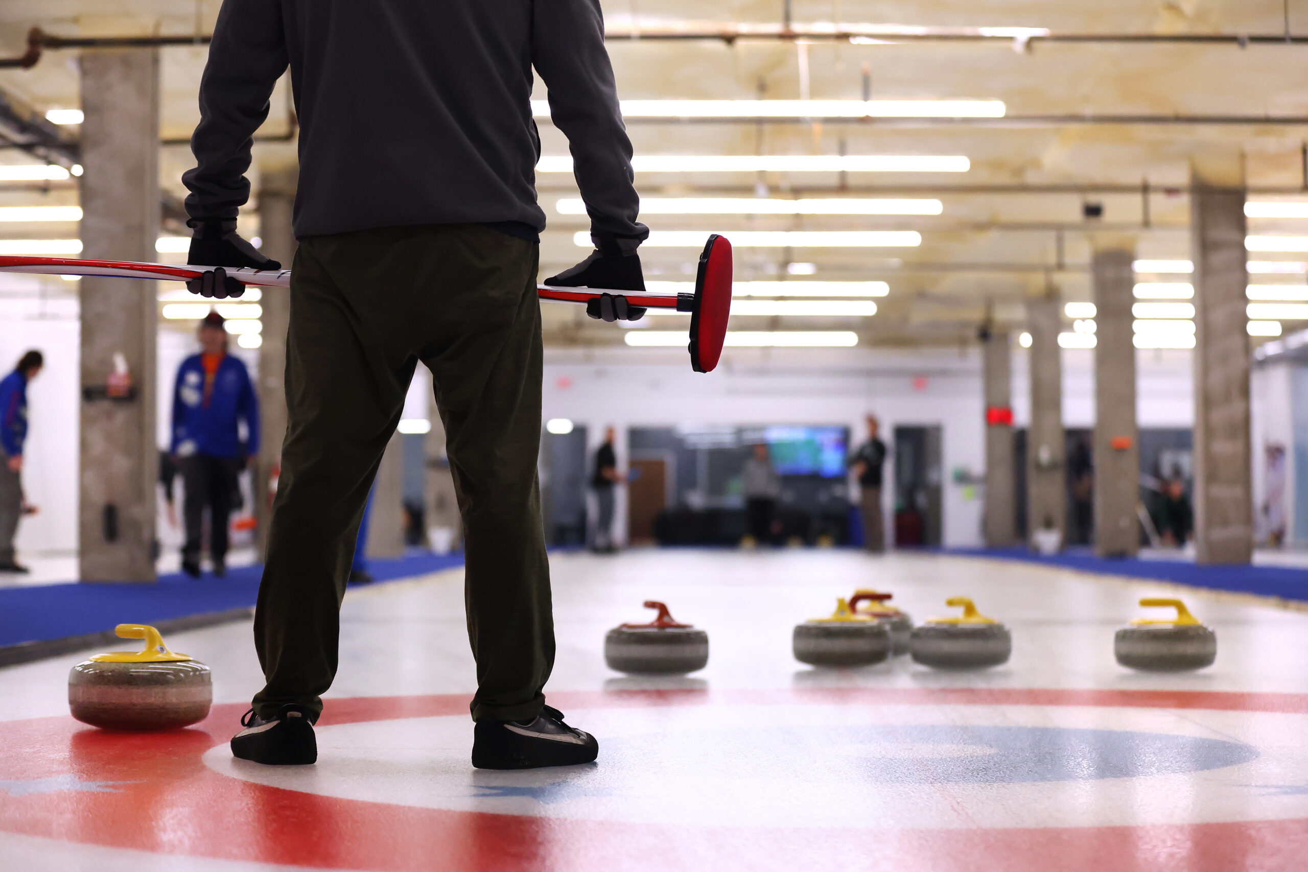 Members of a club league compete at Windy City Curling...