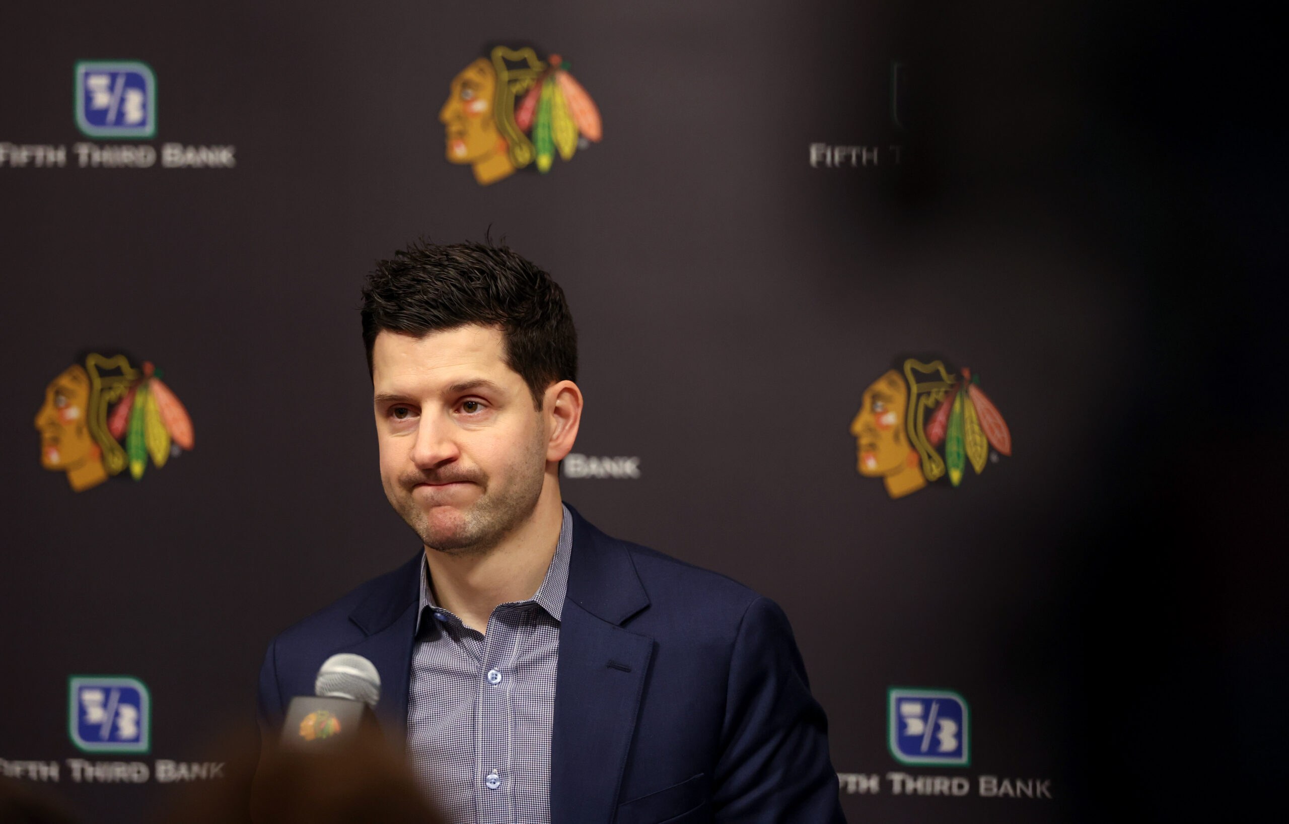 Blackhawks GM Kyle Davidson speaks with the media following the...