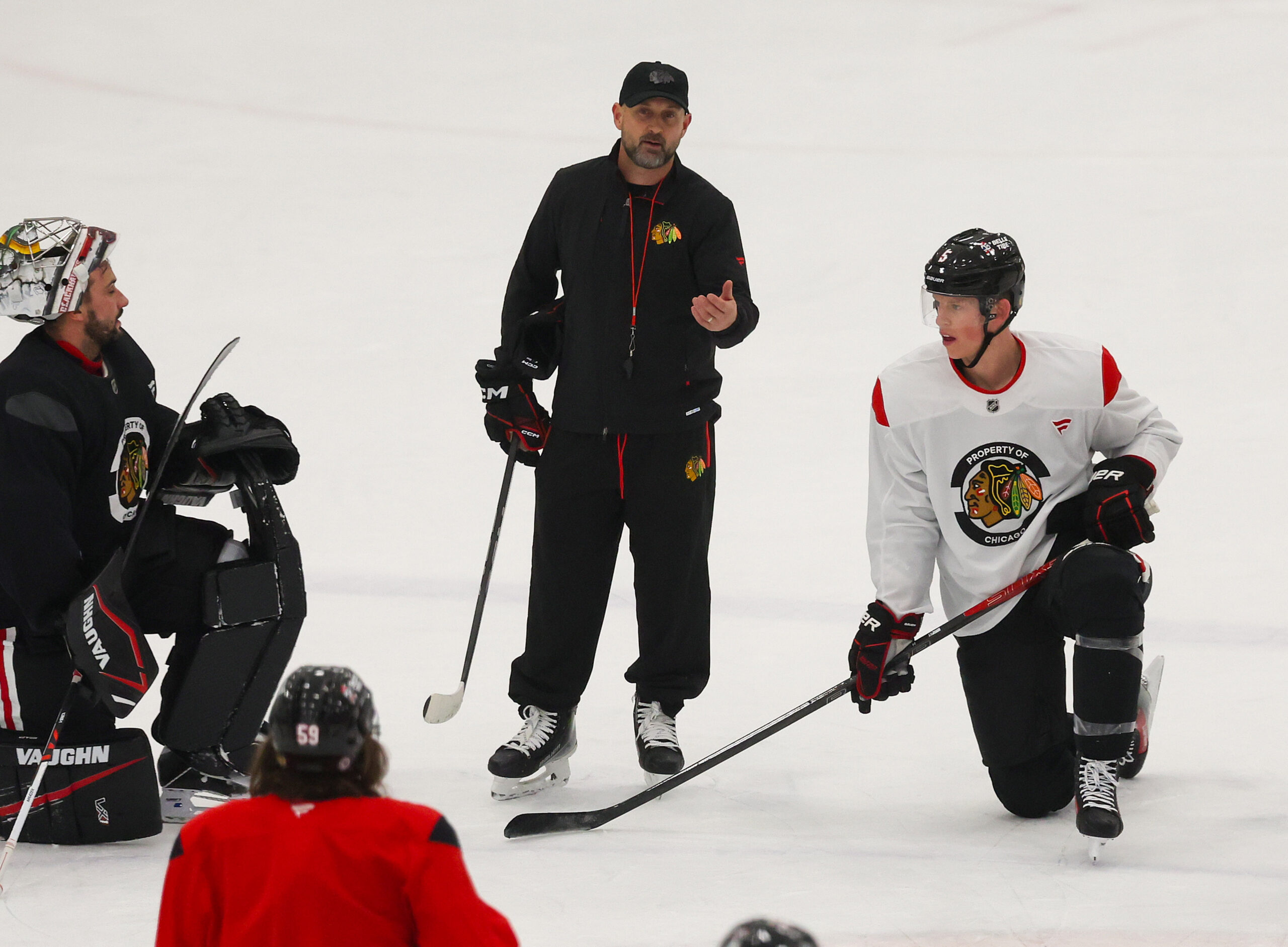 Blackhawks new interim head coach Anders Sorensen runs his first...