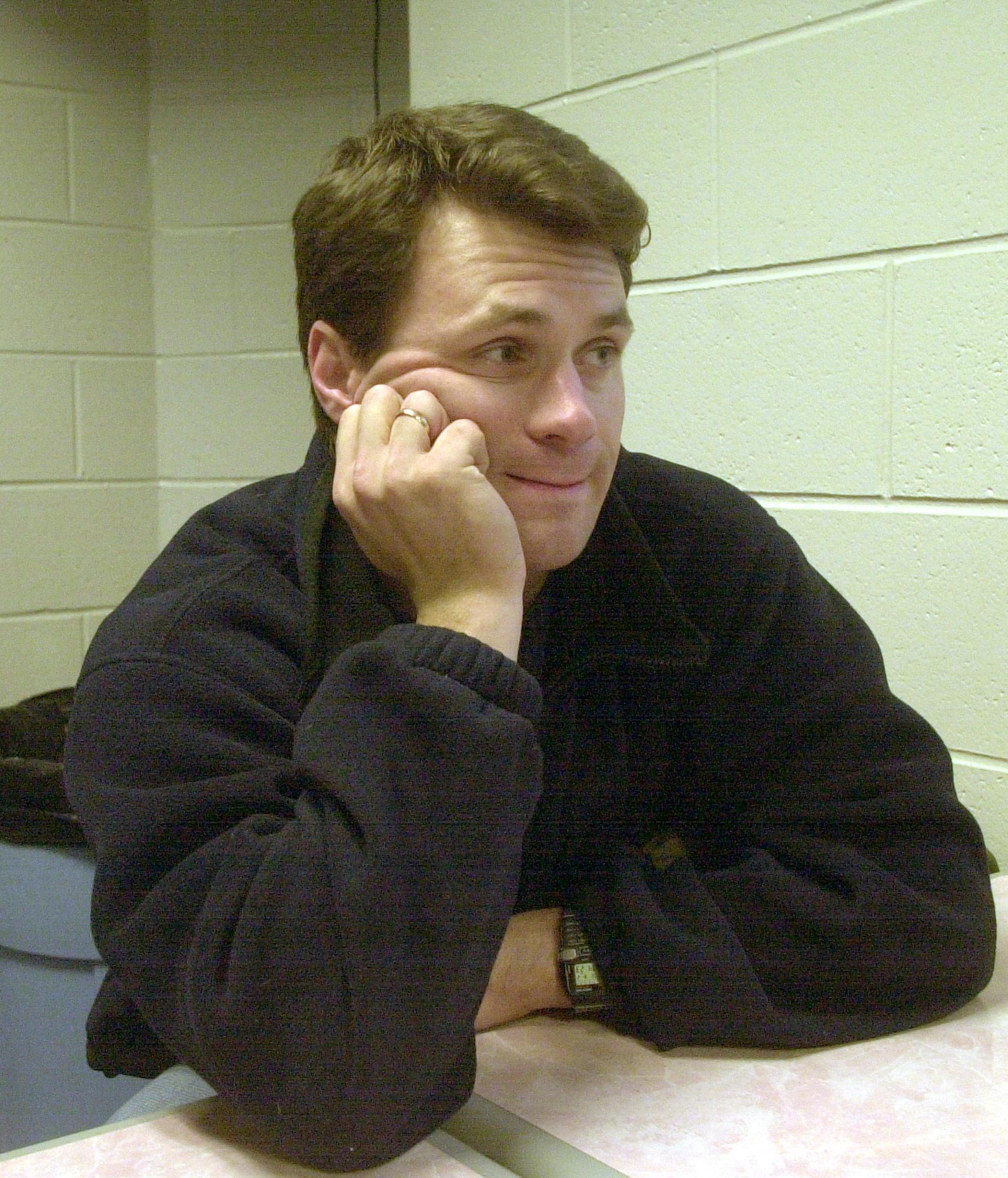 Figure skating coach Vadim Naumov attends an interview in Simsbury,...