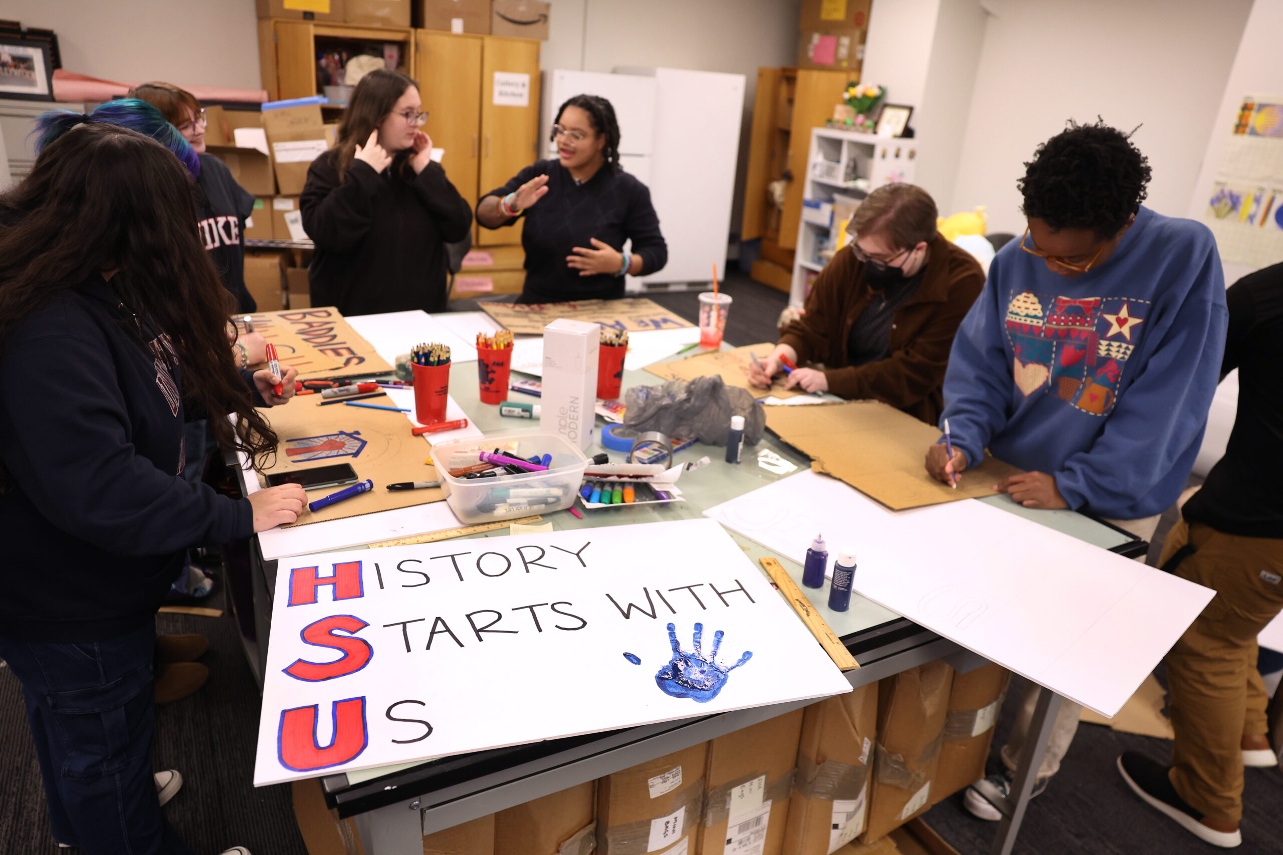 UIC student workers make union rally posters on Jan. 29,...