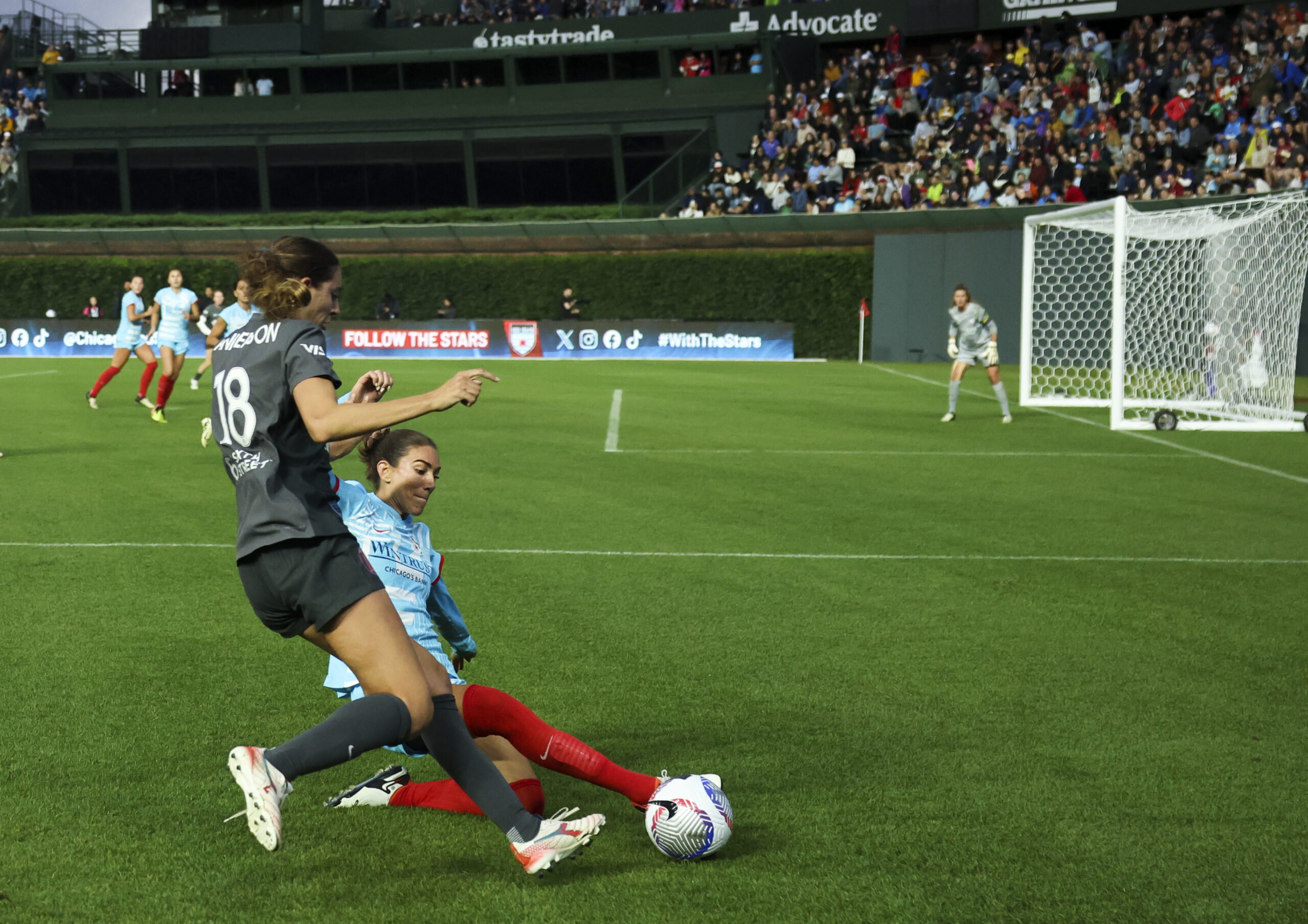 Chicago Red Stars defender Tatumn Milazzo tackles Bay FC’s Joelle...