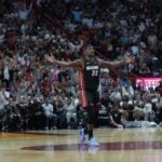 Mar 2, 2024; Miami, Florida, USA; Miami Heat forward Jimmy Butler (22) celebrates as the Heat pull away late in the fourth period at Kaseya Center. Mandatory Credit: Peter Joneleit-USA TODAY Sports