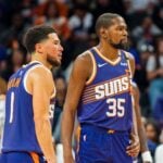 Nov 2, 2024; Phoenix, Arizona, USA; Phoenix Suns guard Devin Booker (1) and forward Kevin Durant (35) react after a time out late in the second half during a game against the Portland Trail Blazers at Footprint Center. Mandatory Credit: Allan Henry-Imagn Images