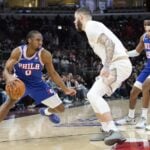 Jan 25, 2025; Chicago, Illinois, USA; Chicago Bulls guard Lonzo Ball (2) defends Philadelphia 76ers guard Tyrese Maxey (0) during the second half at United Center.