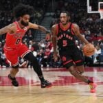 Toronto Raptors guard Immanuel Quickley attacks Chicago Bulls guard Coby White off-the-dribble