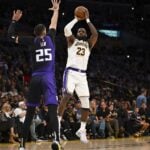 Oct 26, 2024; Los Angeles, California, USA; Los Angeles Lakers forward LeBron James (23) shoots against Sacramento Kings center Alex Len (25) during the second half at Crypto.com Arena. Mandatory Credit: Jonathan Hui-Imagn Images