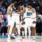 Memphis Grizzlies forward Santi Aldama (7), forward Jaren Jackson Jr. (13), guard Ja Morant (12), guard Desmond Bane (22) and forward Jaylen Wells (0) huddle during the fourth quarter against the Los Angeles Clippers at FedExForum.