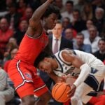 Villanova Wildcats guard Jordan Longino (15) drives against Saint John's Red Storm guard Kadary Richmond (1)