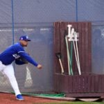 Dodgers reliever Edgardo Henriquez will miss time to start the season. He was seen in a walking boot on Tuesday.